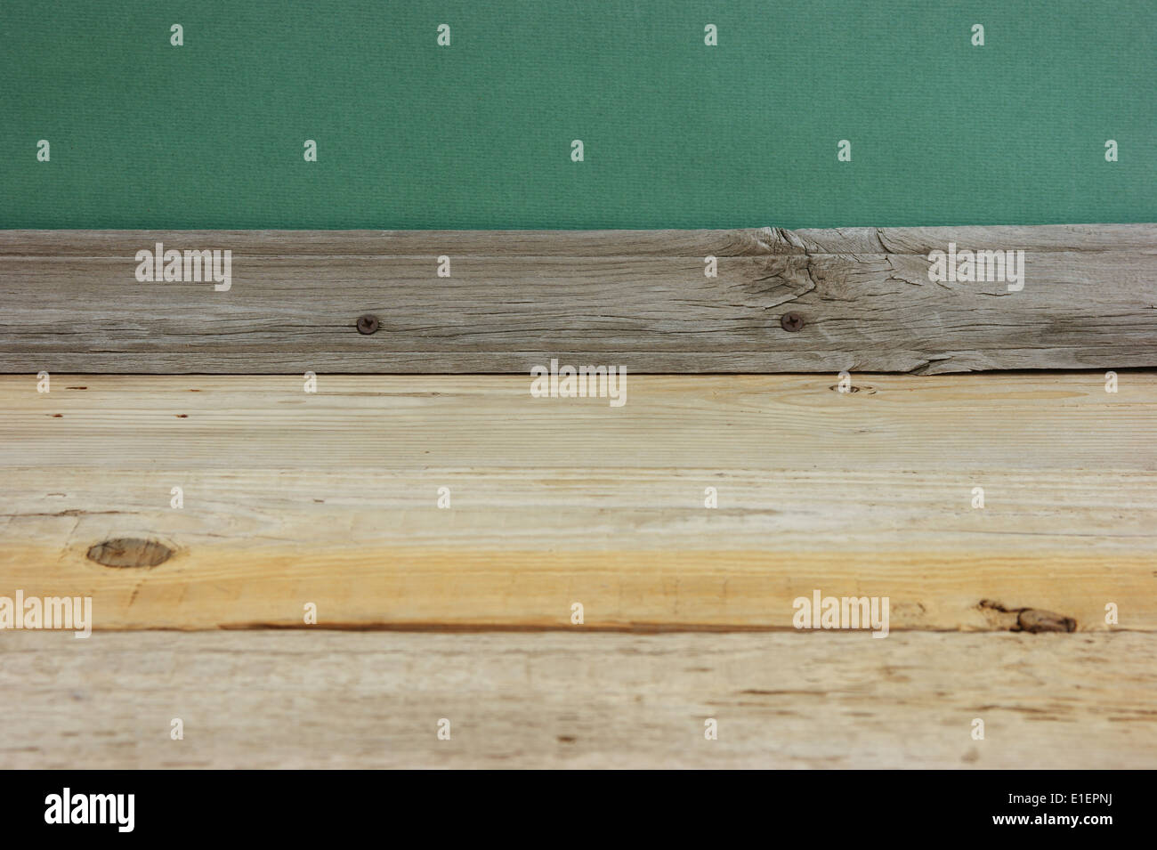 old wooden floor with green wall Stock Photo