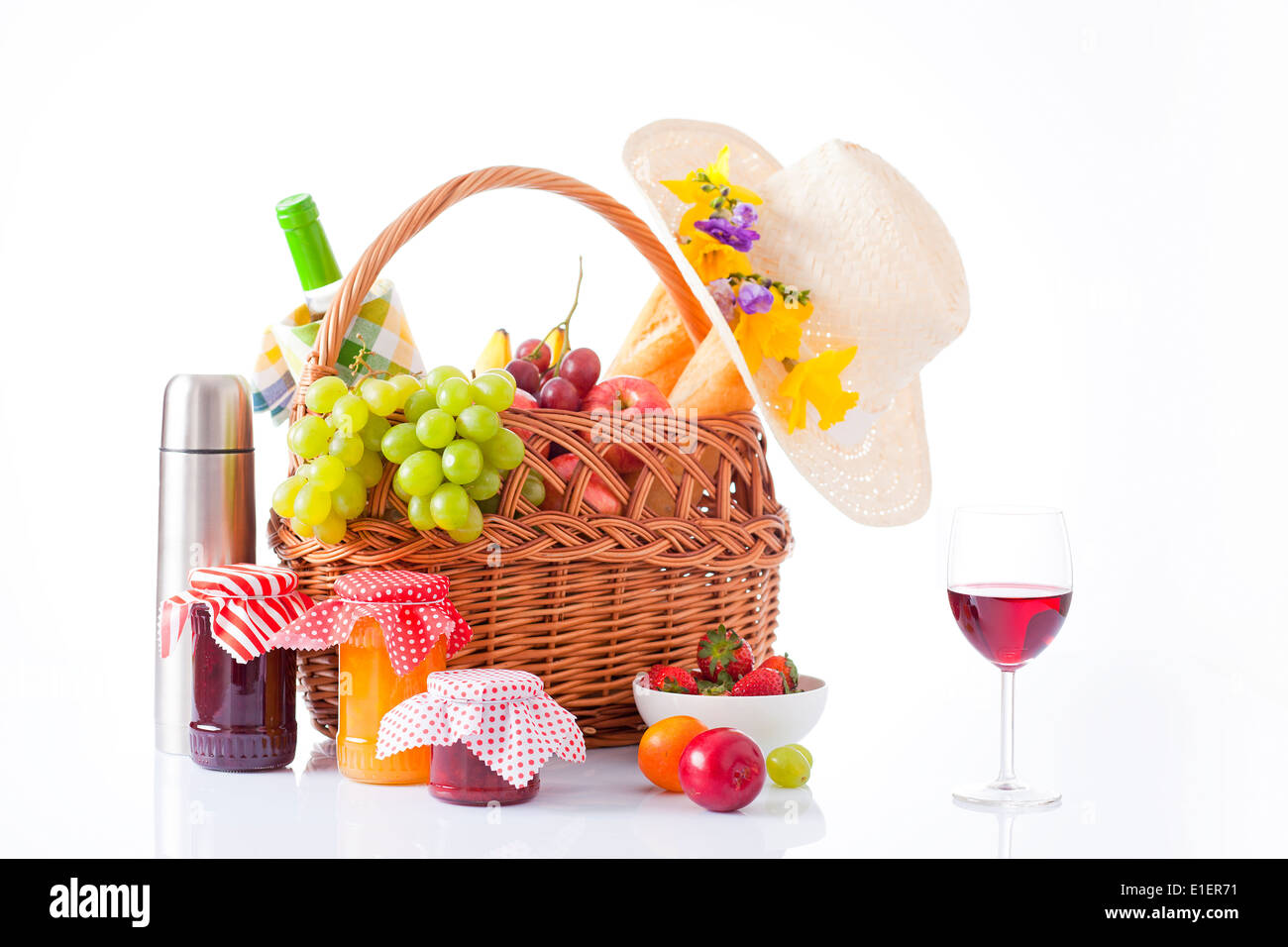 picnic basket with wine, fruit and bread Stock Photo - Alamy
