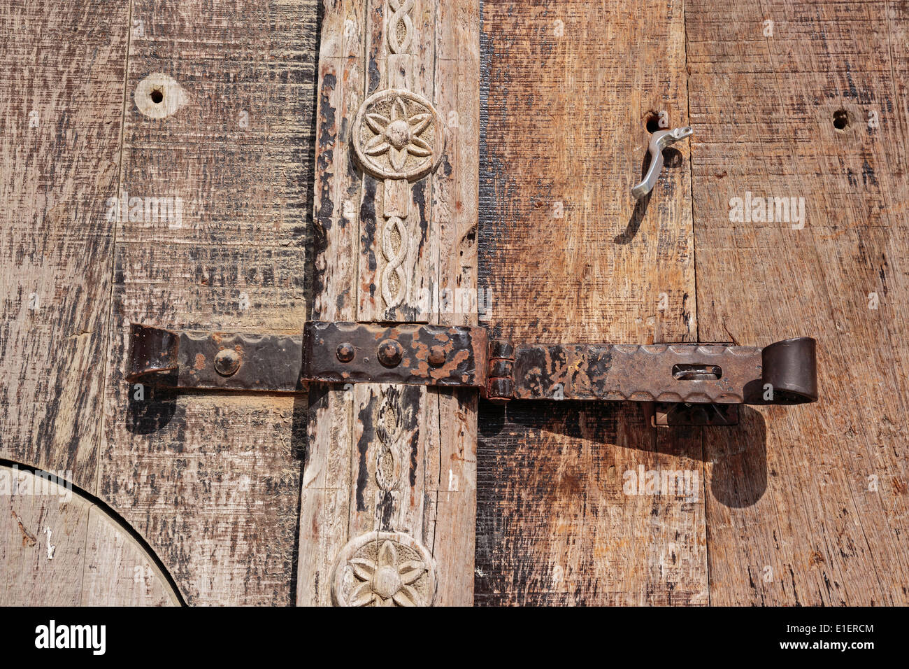 old deadbolt on wooden door Stock Photo Alamy