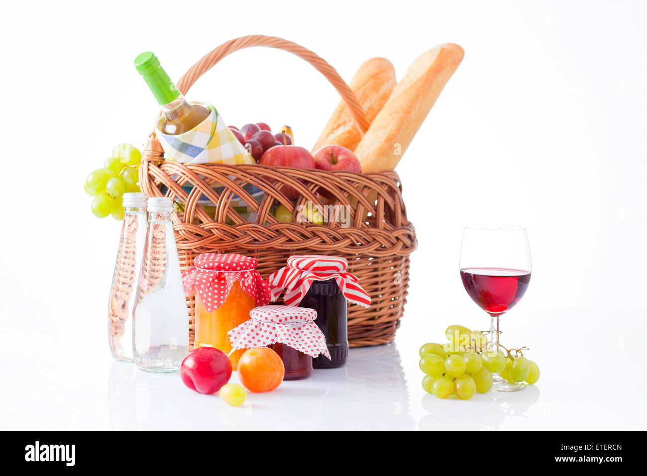 picnic basket with wine, fruit and bread Stock Photo - Alamy