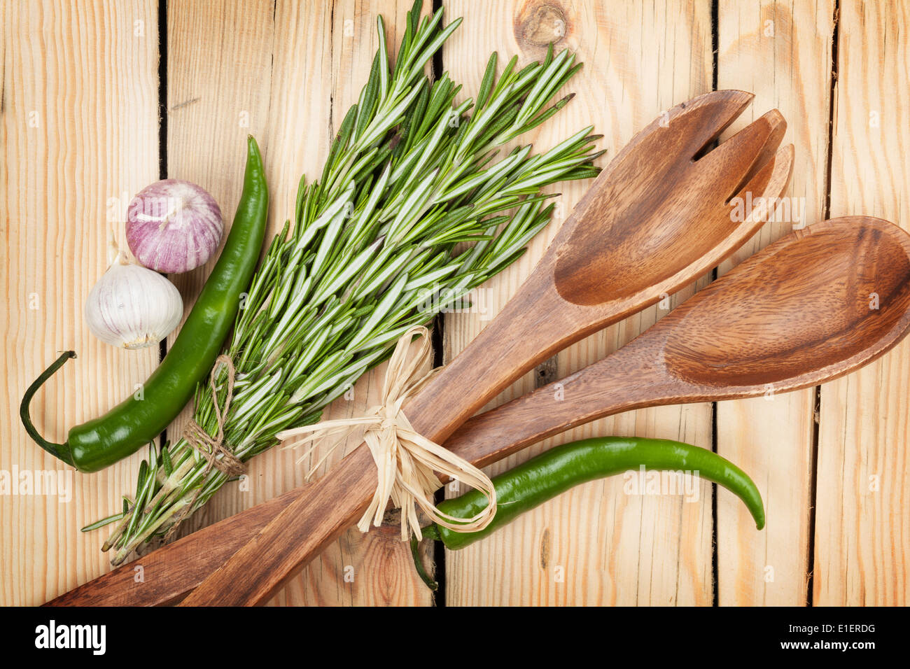 Herbs, spices and utensil on wooden table background Stock Photo