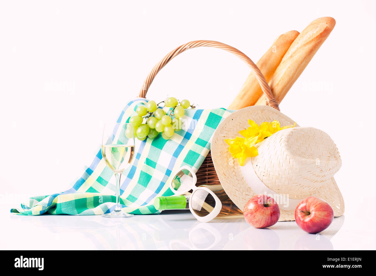 picnic basket with wine, fruit and bread Stock Photo - Alamy