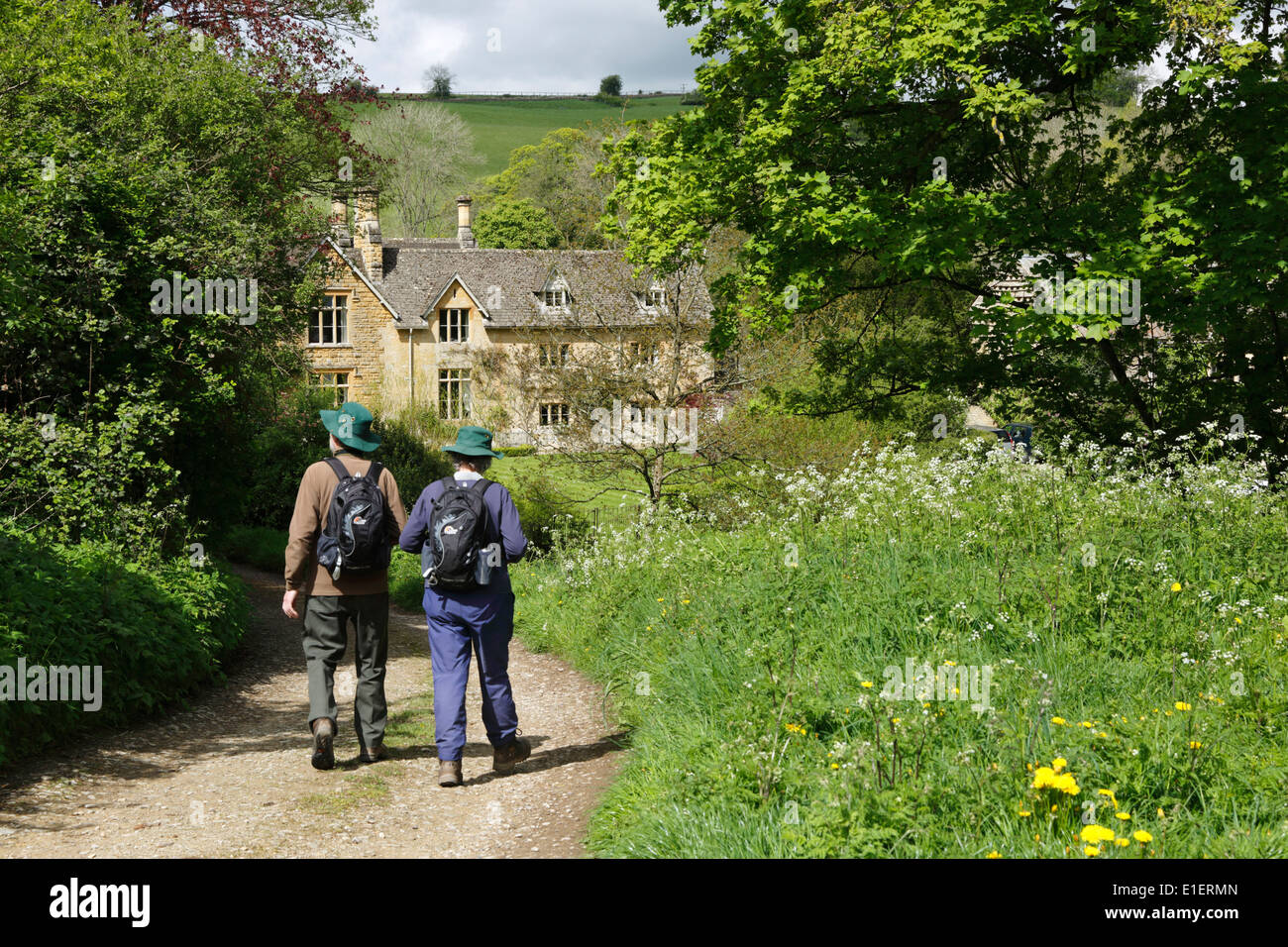 Ramblers on Wardens' Way footpath at Upper Slaughter Stock Photo