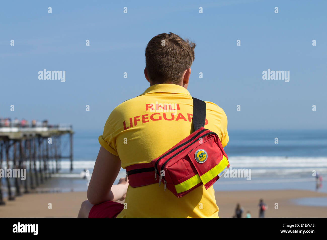 RNLI Lifeguard near Saltburn pier. Saltburn by the sea, north east England, UK Stock Photo