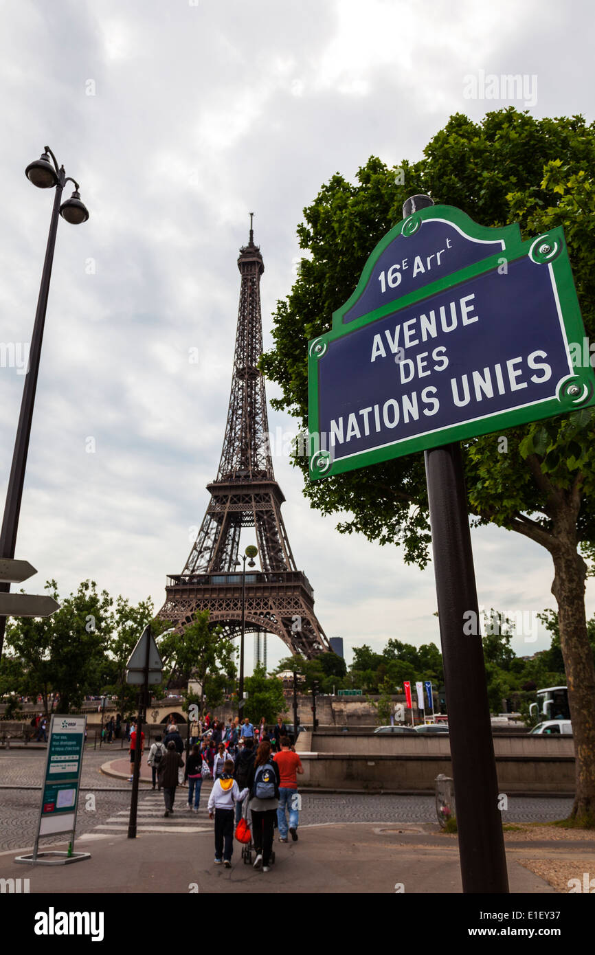 Eiffel Tower framed by trees in Paris city europe european destination avenue des nations unies Stock Photo