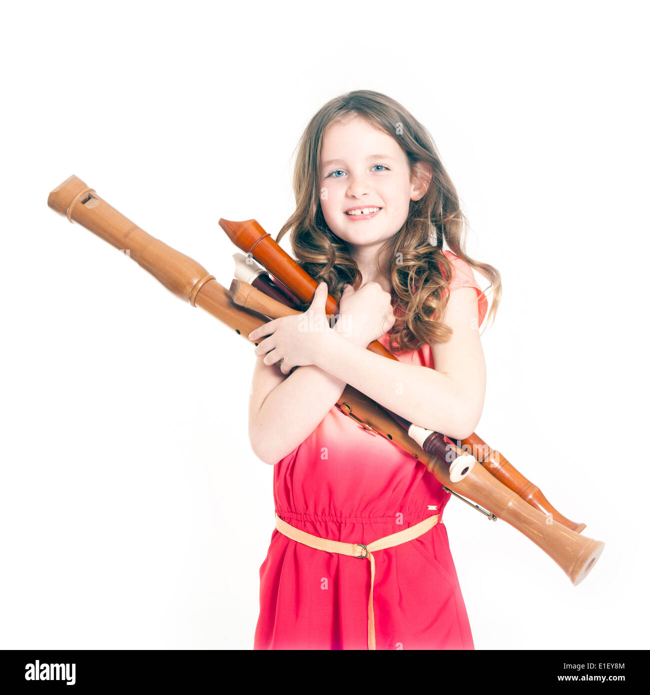 young girl with recorders and white background Stock Photo