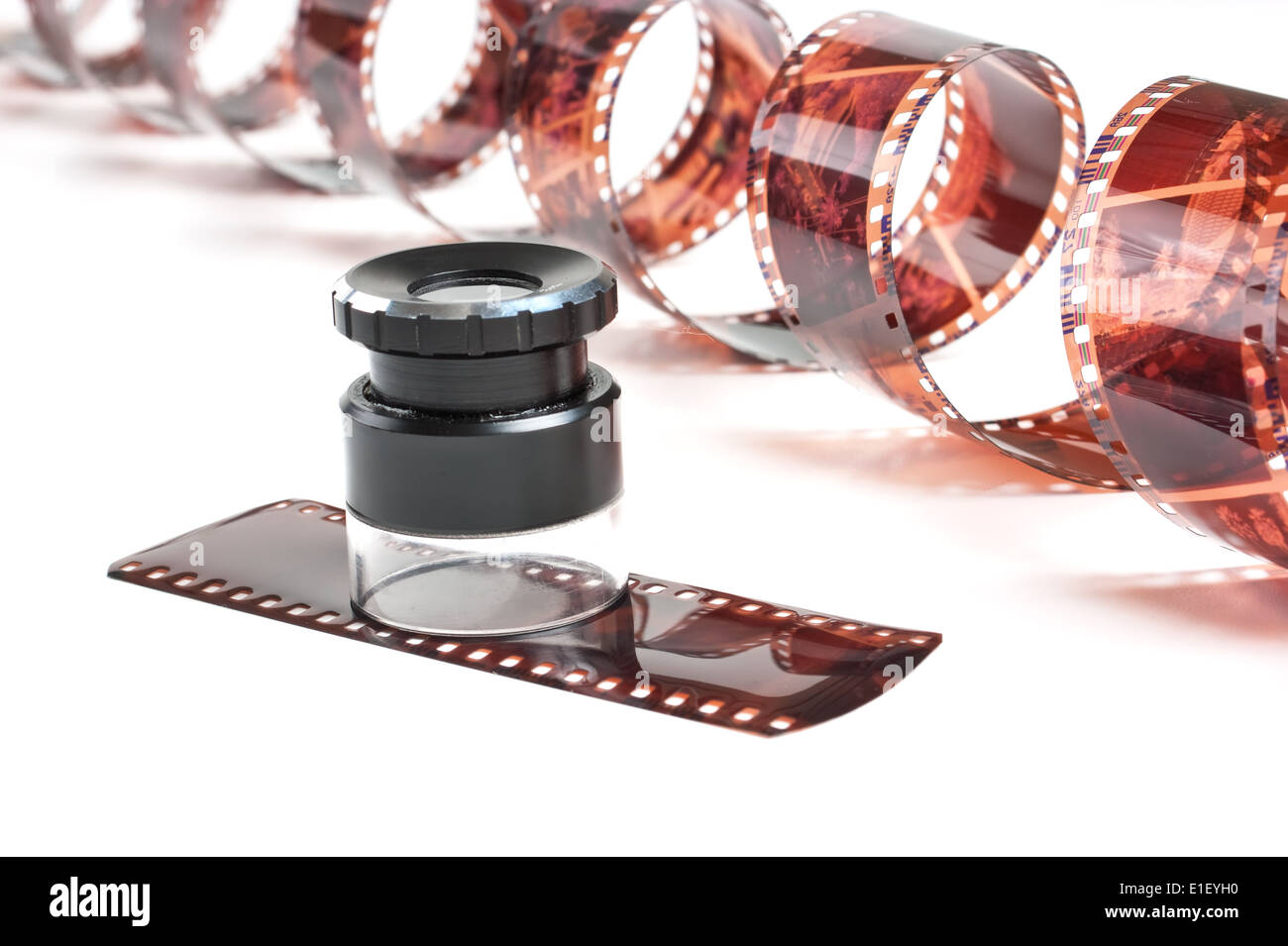 twisted negative film, and Magnifier Stock Photo Alamy