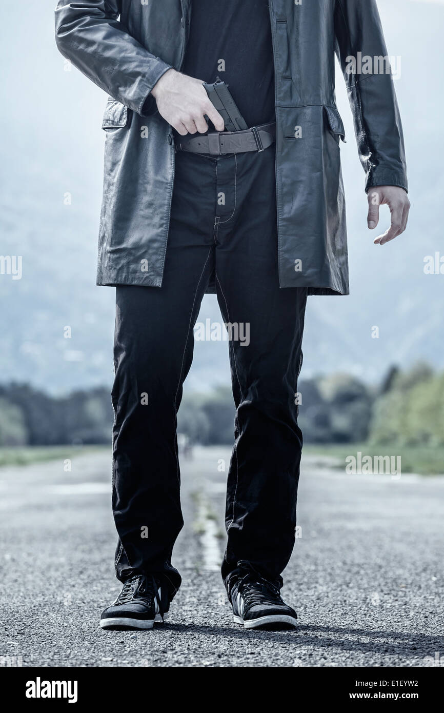 Gun in waistband hires stock photography and images Alamy