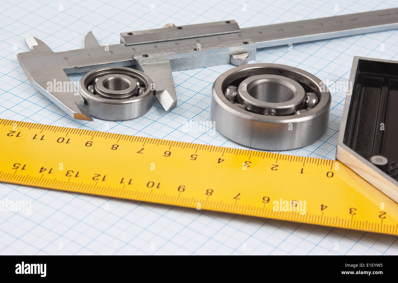 callipers with bearing on graph paper Stock Photo