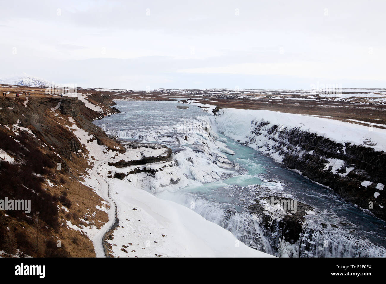 The river Hvita river flows through the Gullfoss gorge and over the Gullfoss waterfall in southwest Iceland. Stock Photo