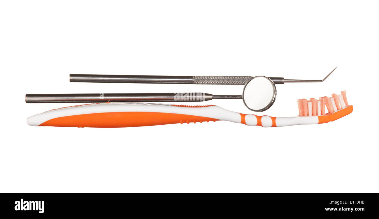 toothbrush and dental Instruments isolated on a white background Stock