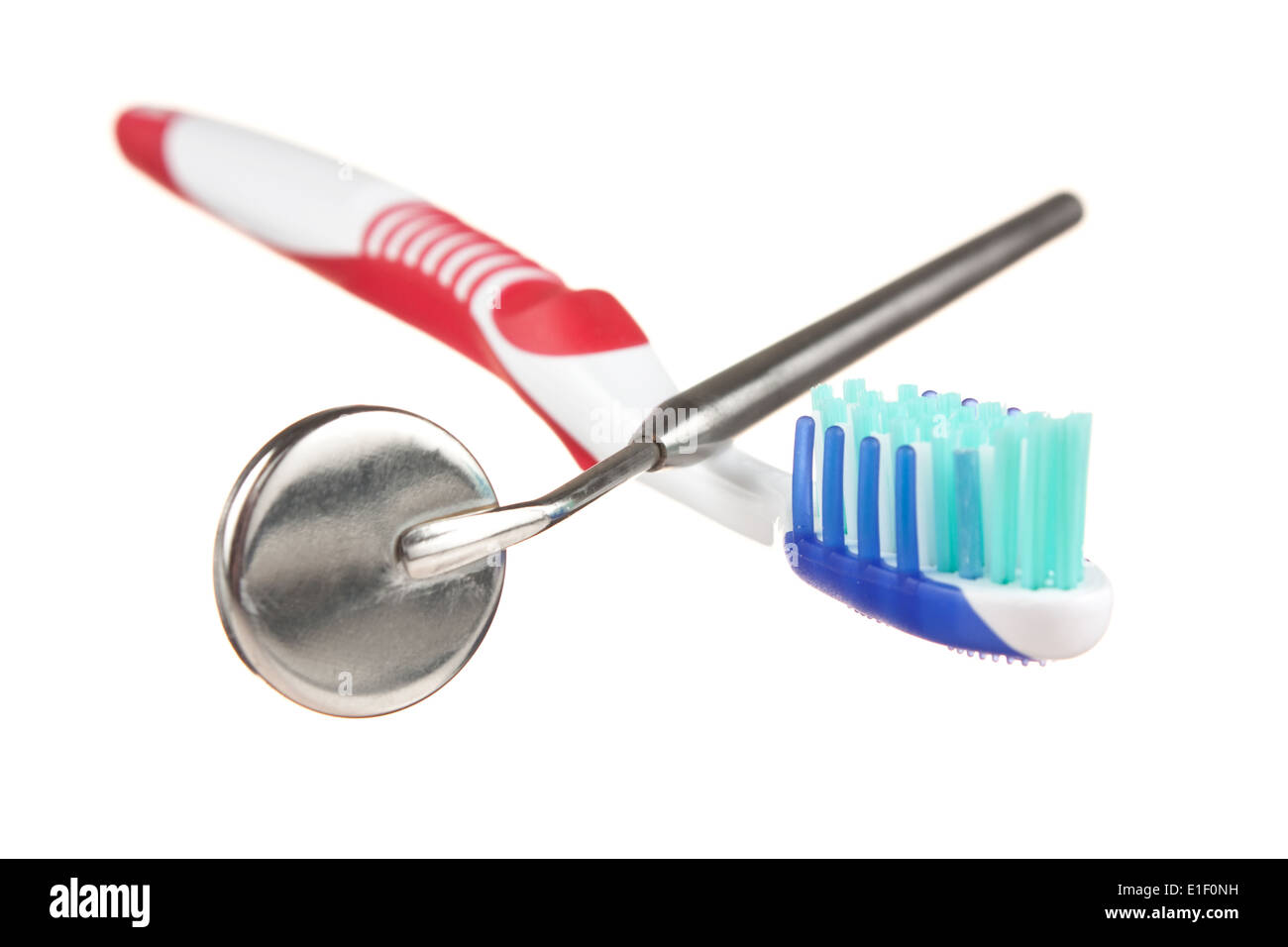 toothbrush and dental Instruments isolated on a white background Stock
