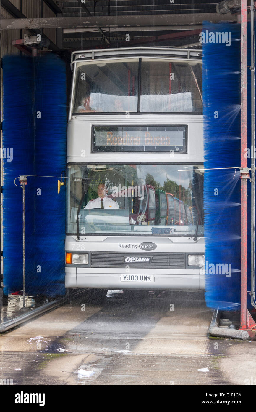 Bus using mechanical automated washer. Reading, Berkshire, England, GB, UK. Stock Photo