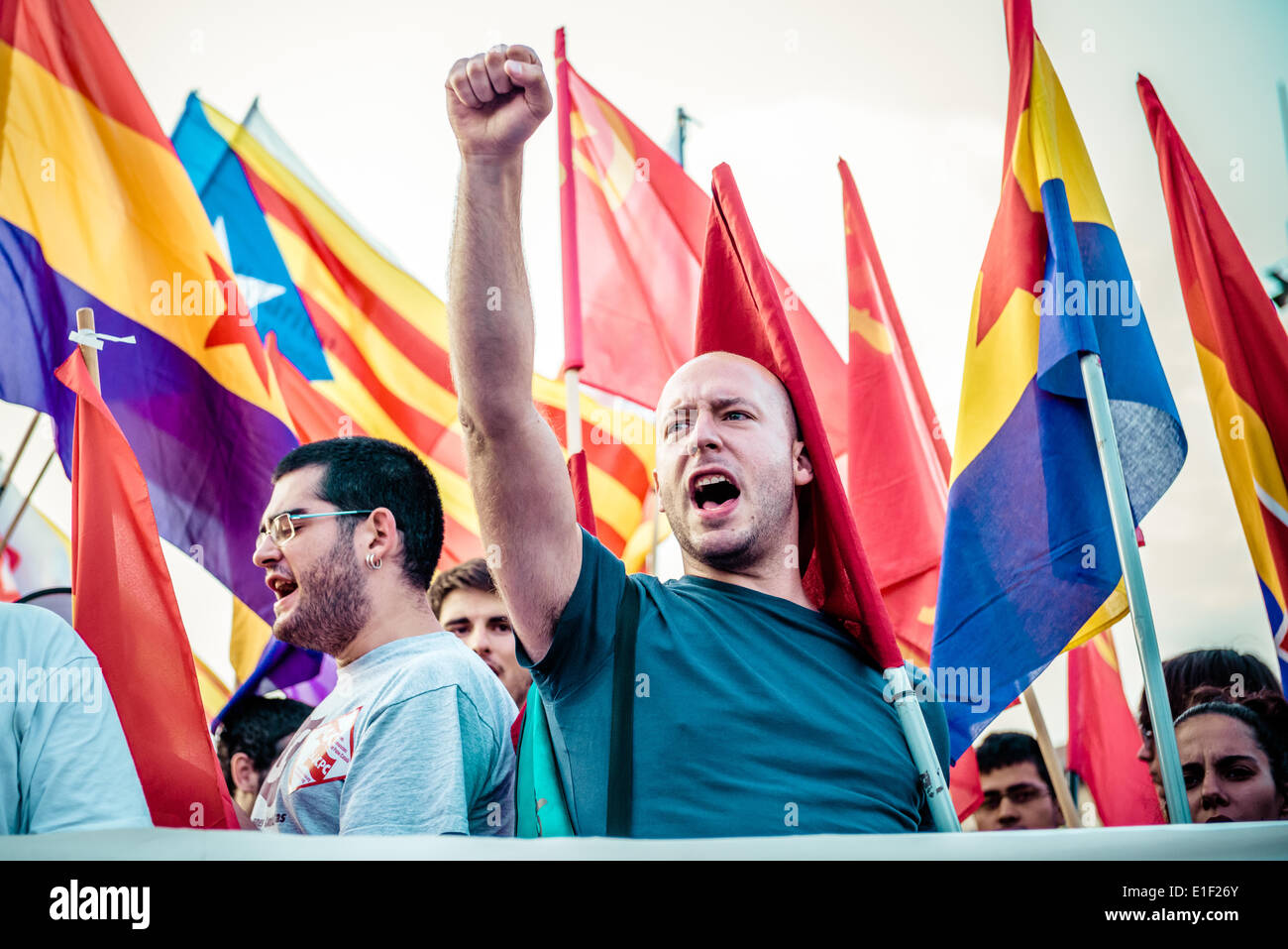 Barcelona, Spain. 2nd June 2014.  A communist protestor for a socialist republic shouts slogans against the Spanish monarchy in Barcelona Credit:  matthi/Alamy Live News Stock Photo