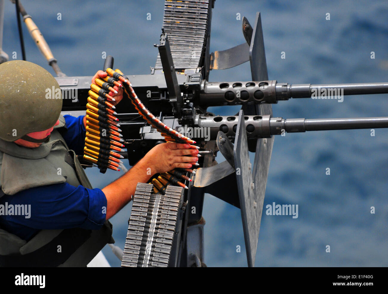 U.S. Navy Gunner?s Mate 3rd Class Matthew Montalbano loads a Stock