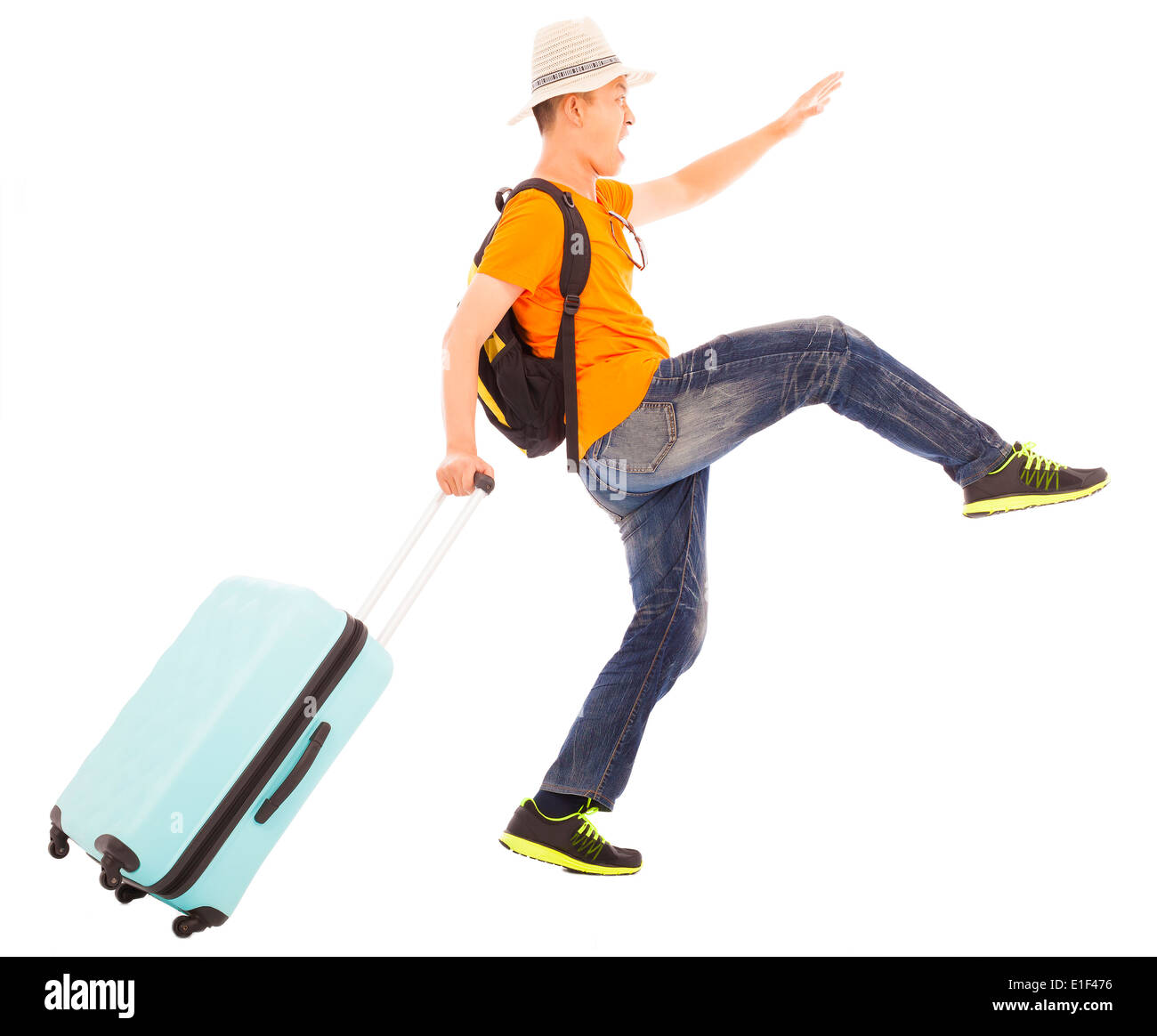 young backpacker making a funny walking pose Stock Photo