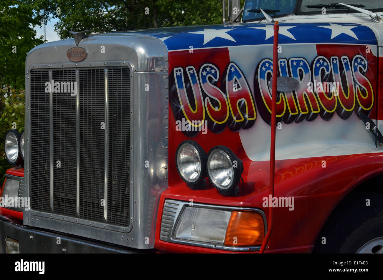 The circus is in town! Big American trucks, brightly painted Stock Photo