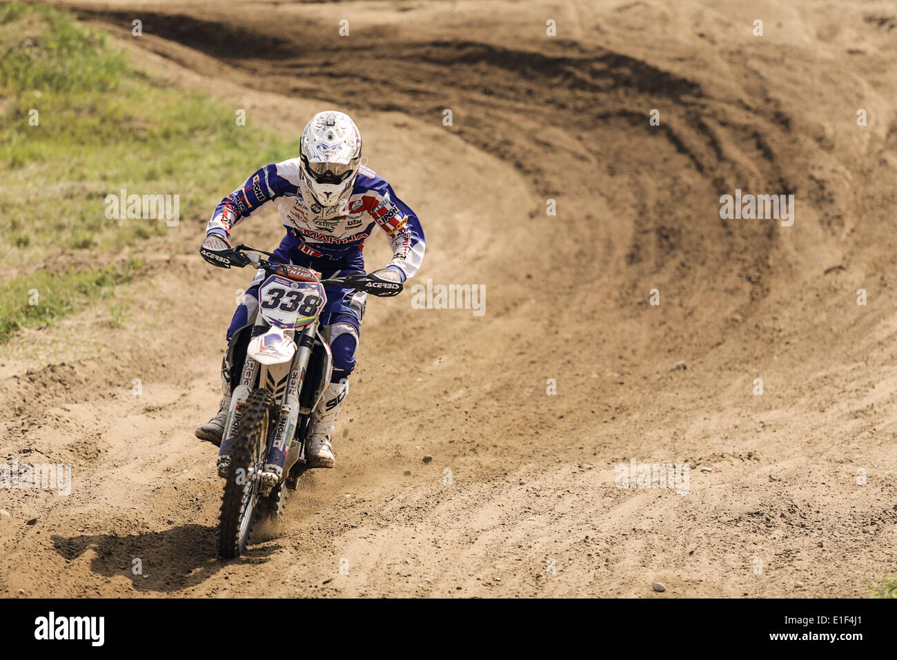 Motocross racer on dirt  track Stock Photo