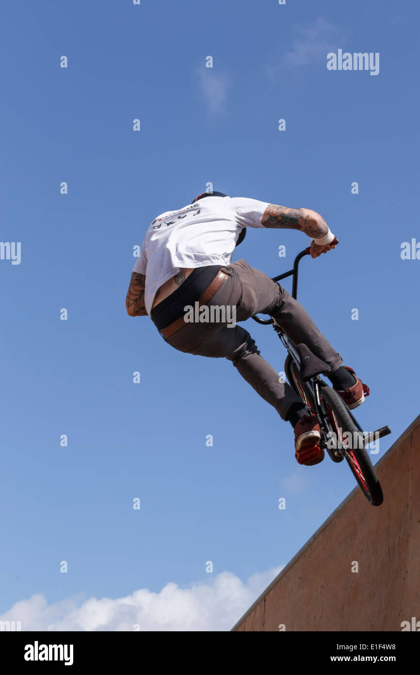 BMX stunt rider in full flight. Stock Photo