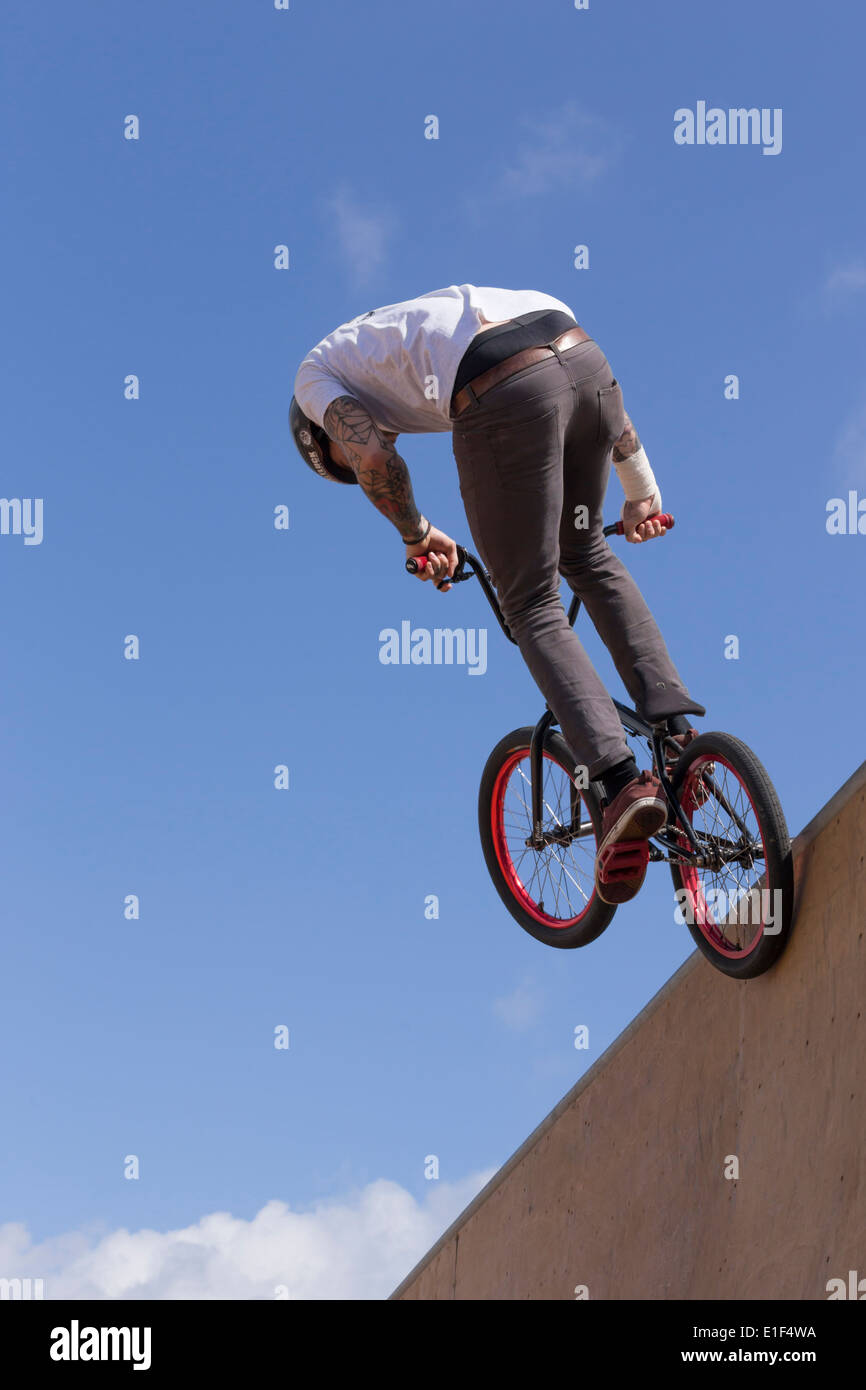 BMX stunt rider in full flight. Stock Photo