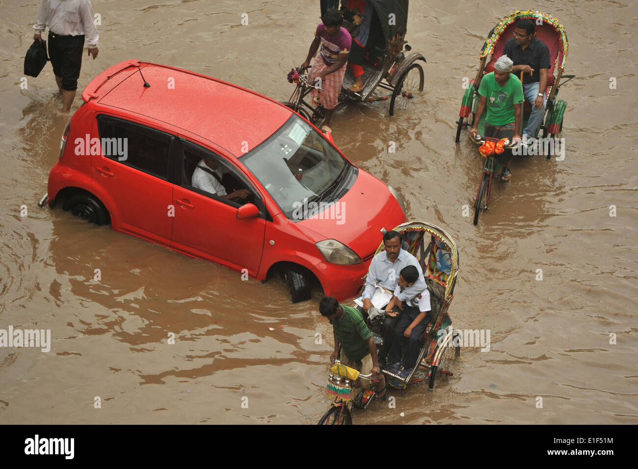 Water submerged road at Razarbag Road in Dhaka. Incessant rain has
