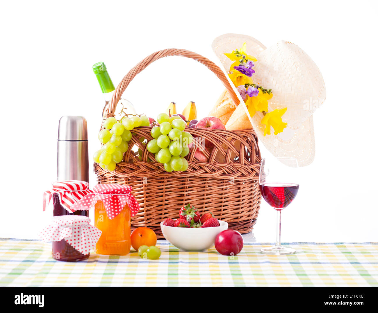 picnic basket with wine, fruit and bread Stock Photo - Alamy