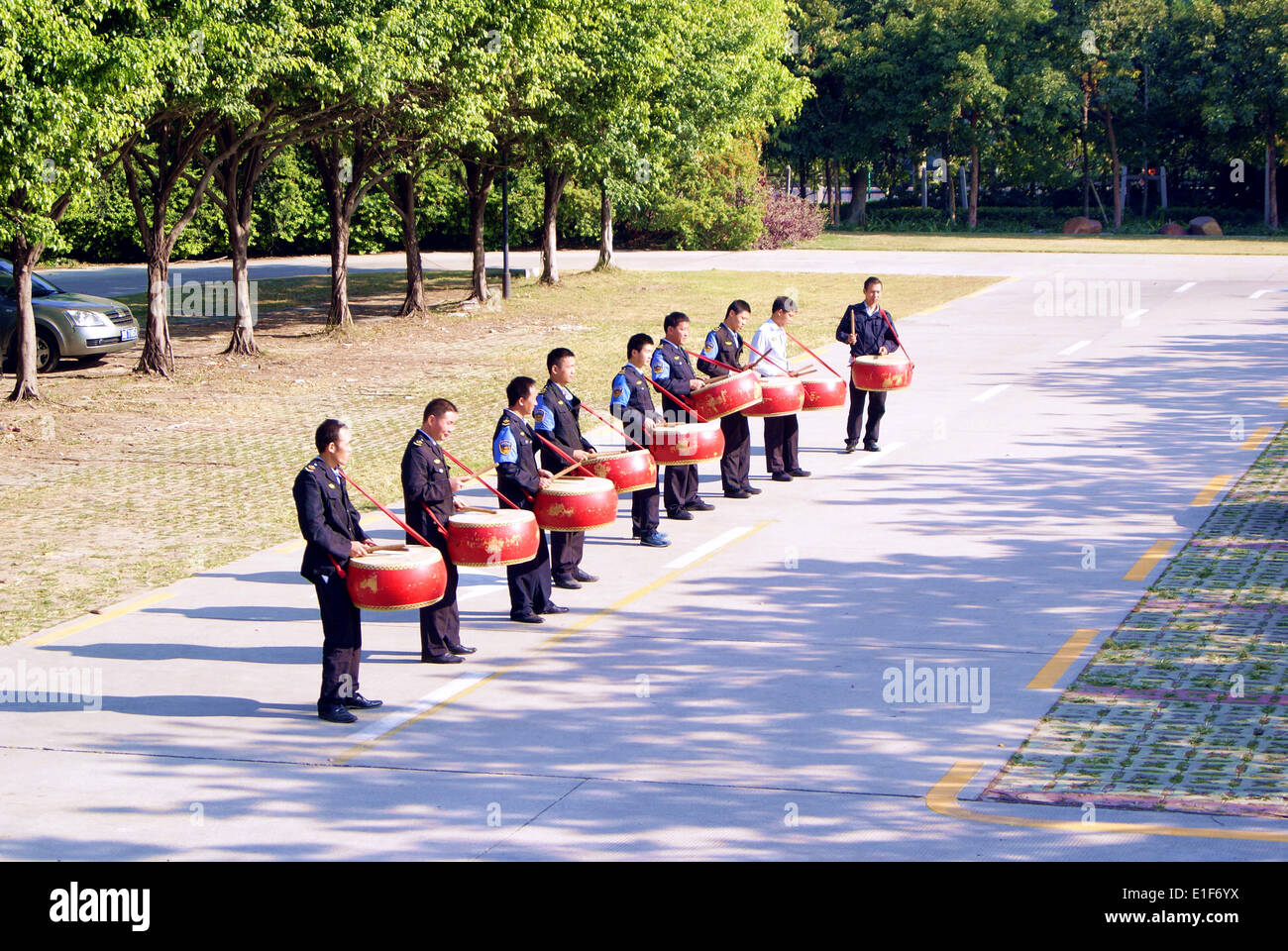 The Chinese community security guard the drums in practice Stock Photo