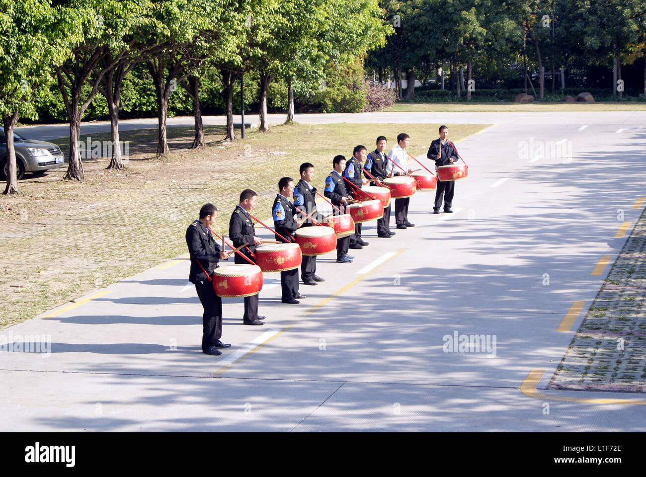 The Chinese community security guard the drums in practice Stock Photo