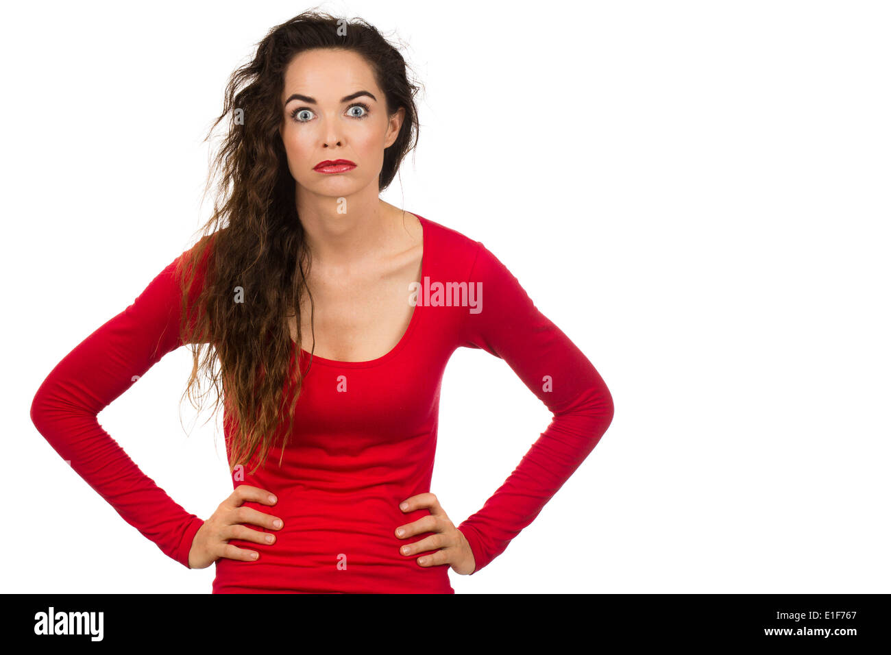 A tired, frustrated and fed up woman looking at camera. Isolated on white. Stock Photo