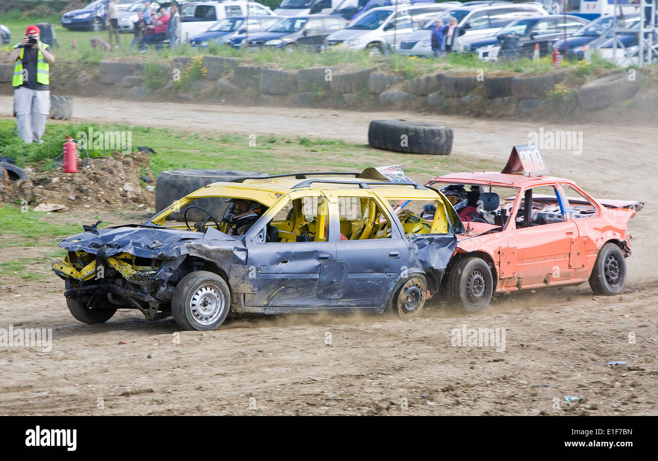 Banger racing cars in action at Stansted Raceway in Essex UK Stock Photo