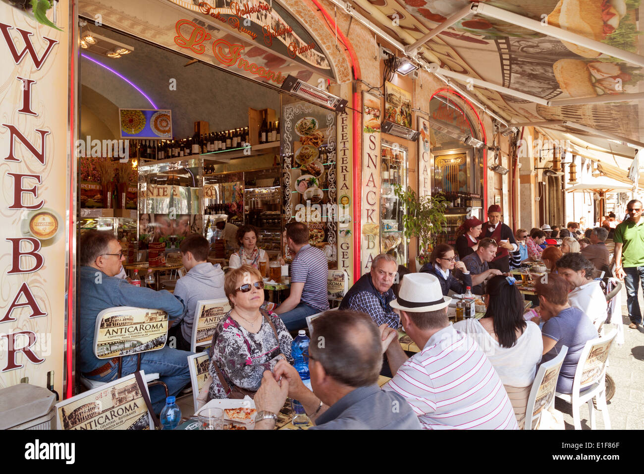 People eating and drinking at a street cafe in Rome, Italy Europe Stock Photo