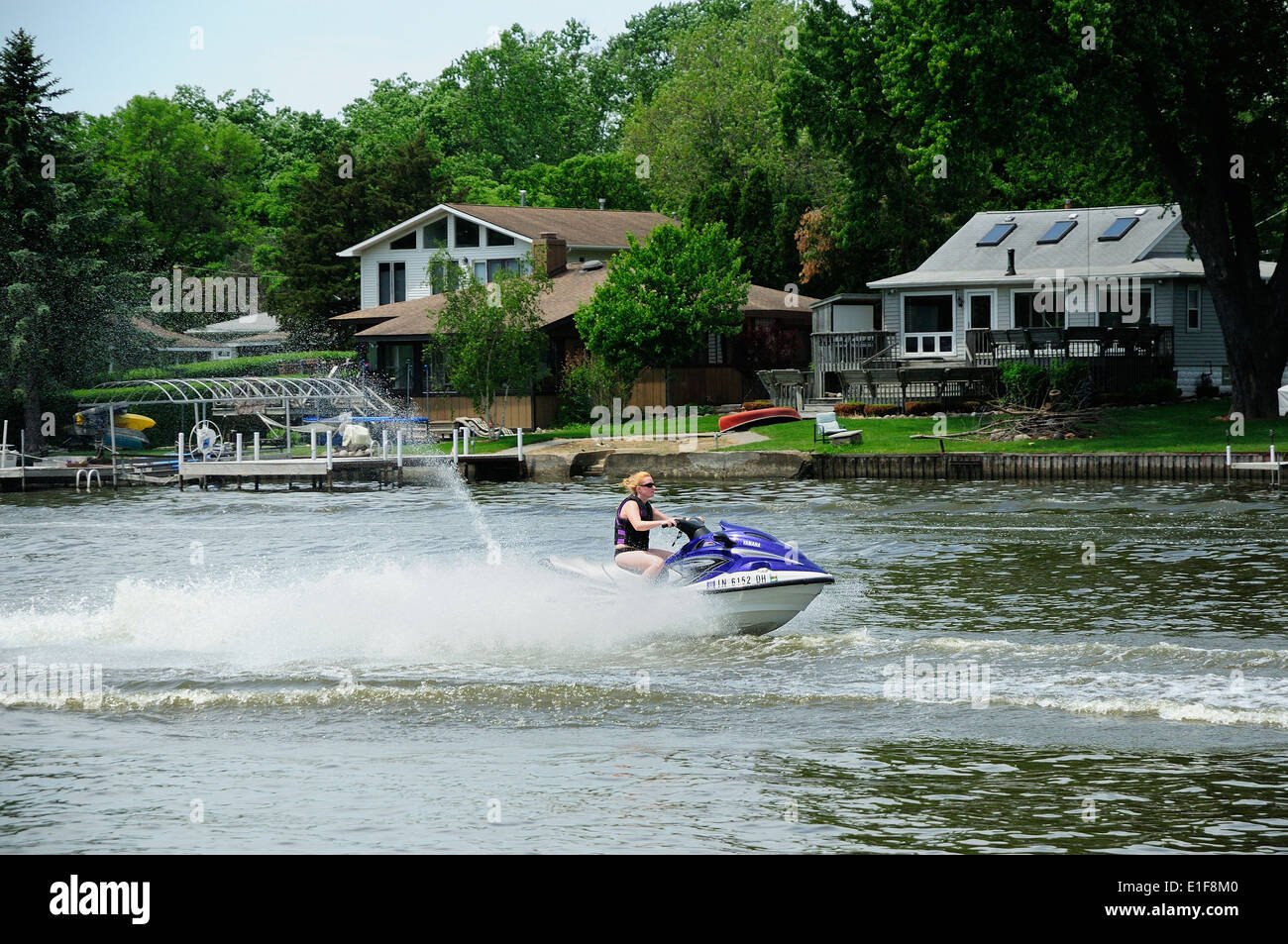 People enjoying pleasure boating/ jet skiing on the Fox River in Northern Illinois Stock Photo