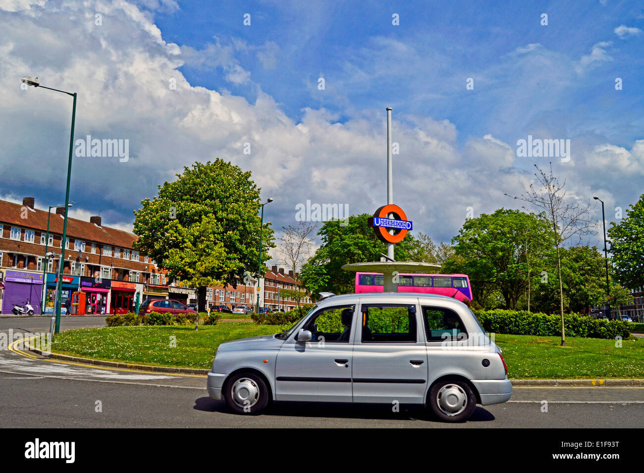 Taxi cab opposite Queensbury Underground Station, London Borough of Brent, London, England, United Kingdom Stock Photo