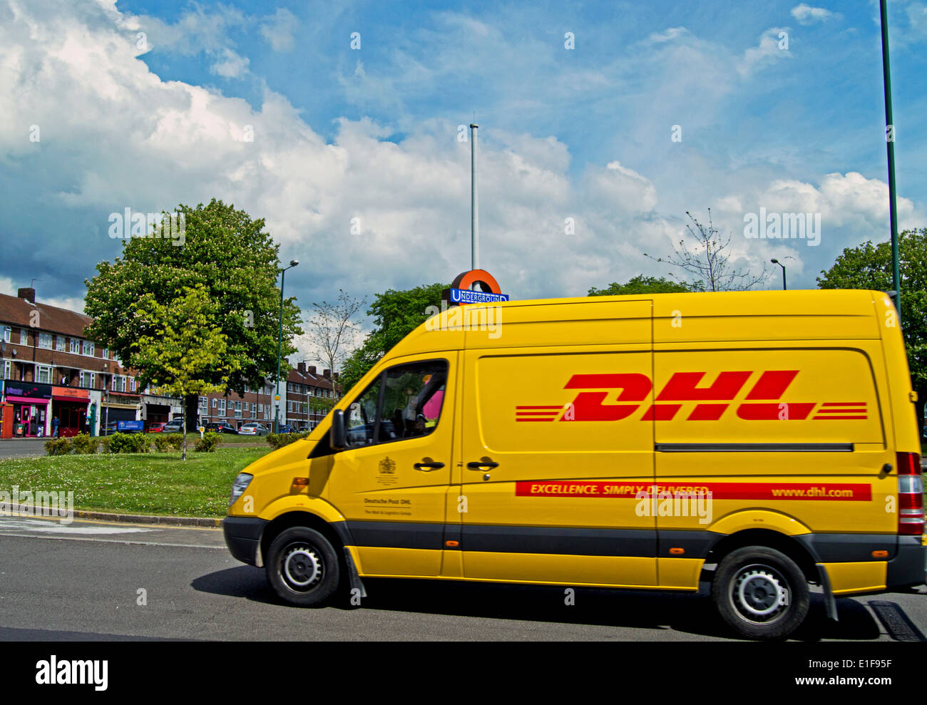 DHL van opposite Queensbury Underground Station, London Borough of Brent, London, England, United Kingdom Stock Photo