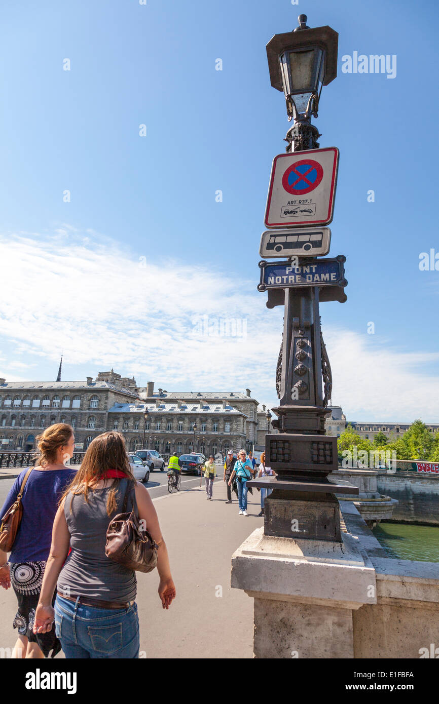 Pont Notre Dame Paris France bridge sign light pedestrians tourists ...