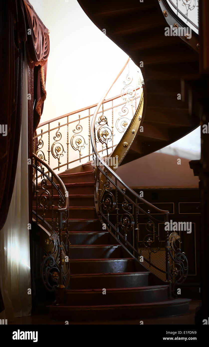 Vertical color shot of a vintage spiral staircase Stock Photo - Alamy