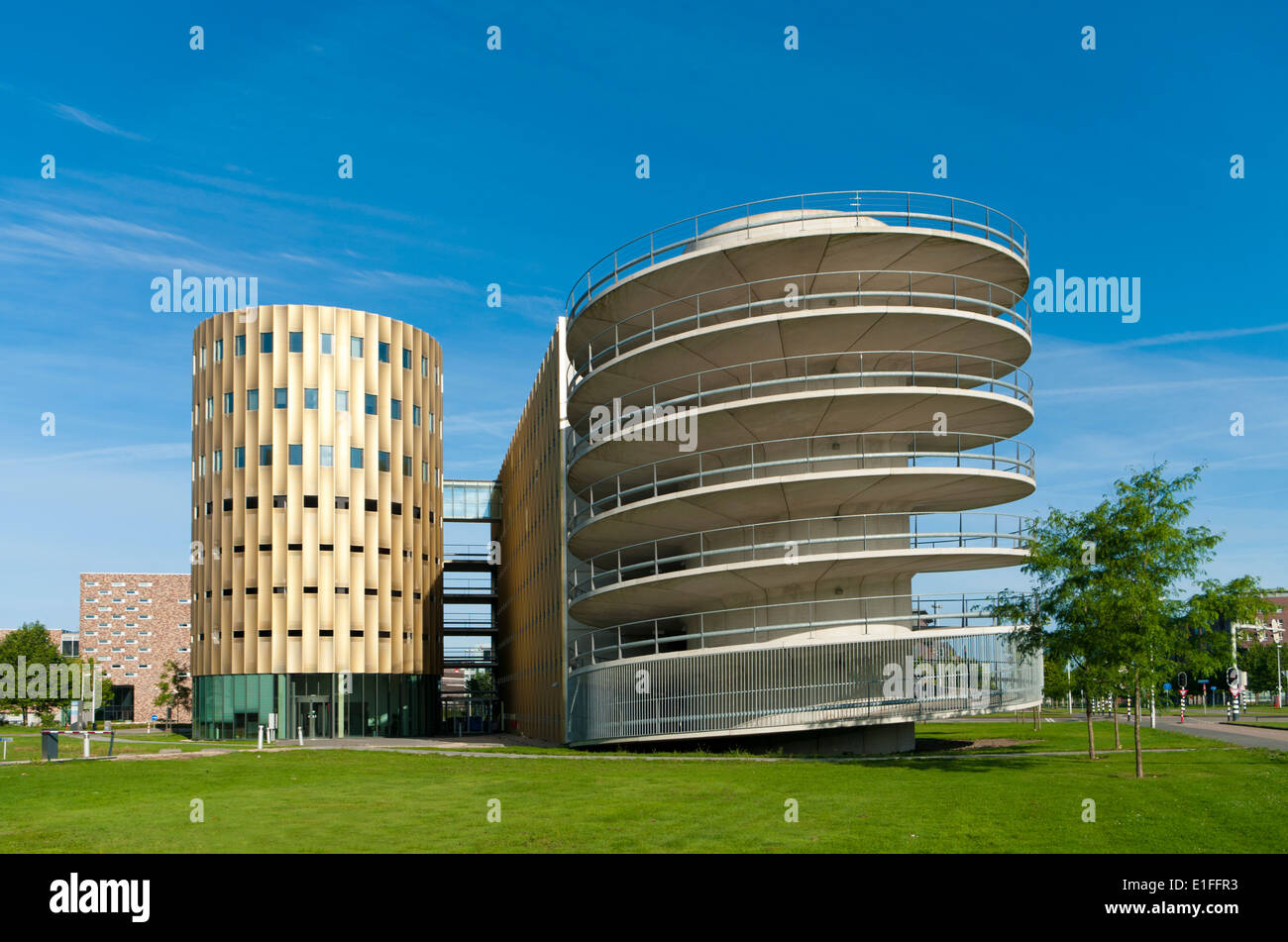 office building with parking garage Stock Photo - Alamy