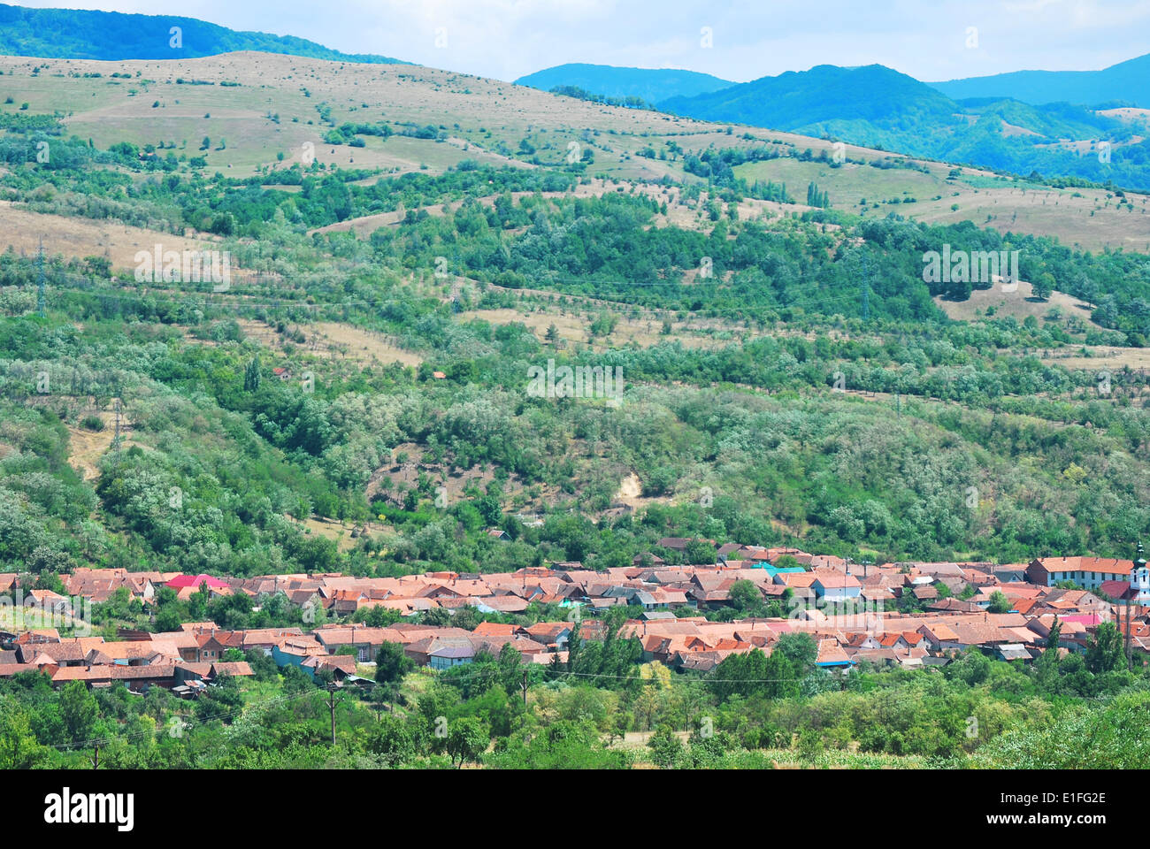 Small village near forest Stock Photo - Alamy