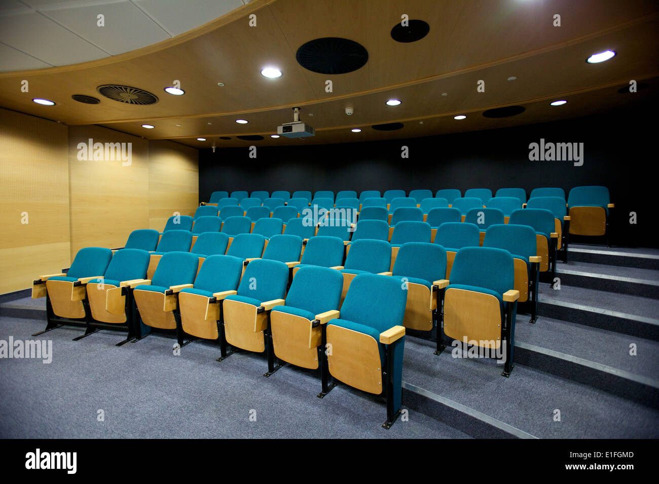 Lecture theatre seating in auditorium setting Stock Photo - Alamy