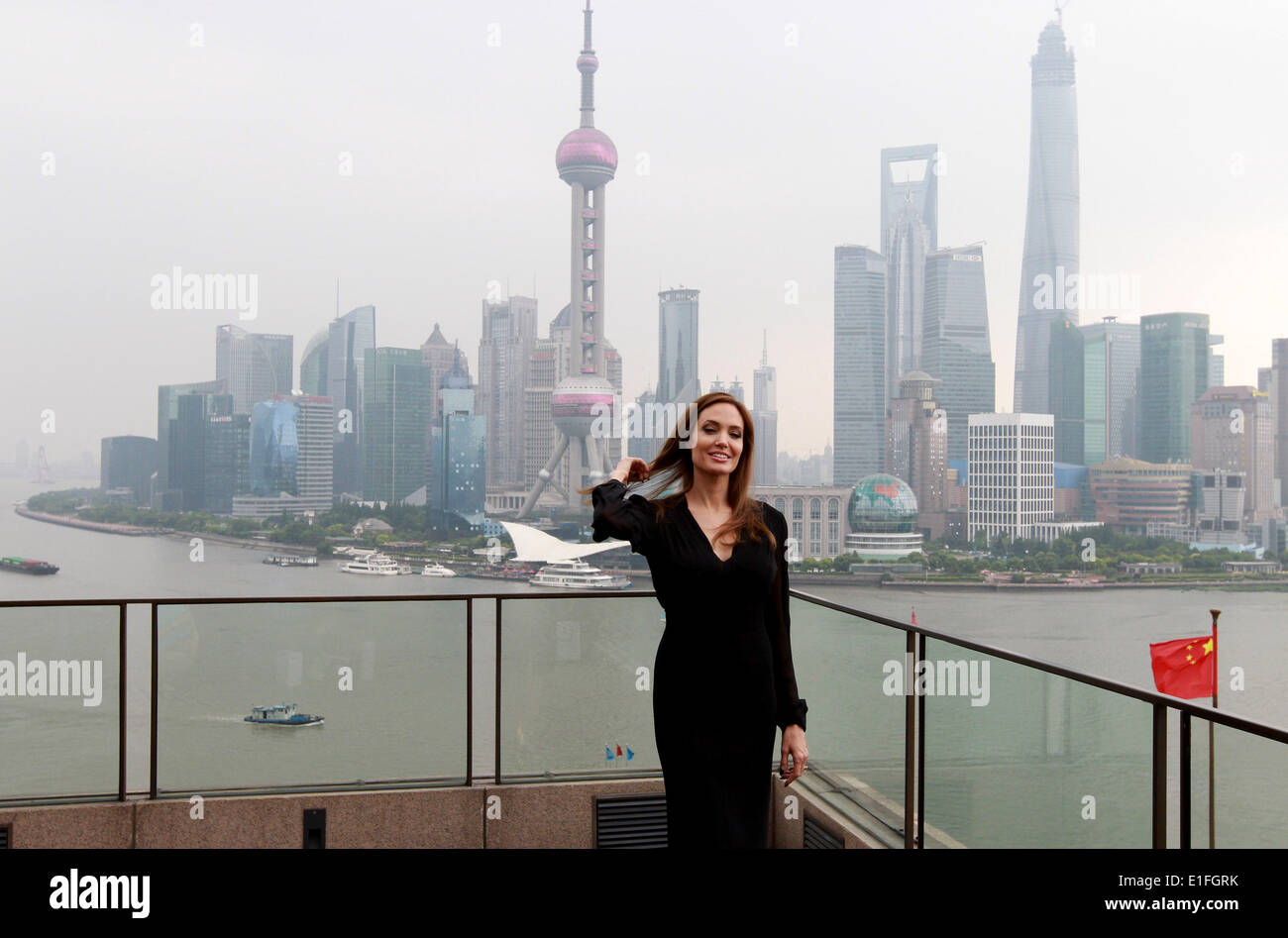 Shanghai, China. 3rd June, 2014. American actress Angelina Jolie meets the media on the Bund in east China's Shanghai, June 3, 2014. Angelina Jolie will promote 'Maleficent', a fantasy adventure film she starred in, during her Shanghai visit, which is also her first time to the Chinese mainland. 'Maleficent' will be debuted in the Chinese mainland on June 20. Credit:  Ren Long/Xinhua/Alamy Live News Stock Photo
