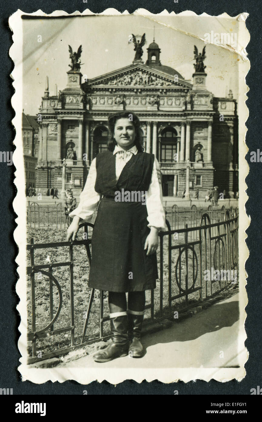 USSR - CIRCA 1950s: An antique photo shows woman on a background of the museum Stock Photo