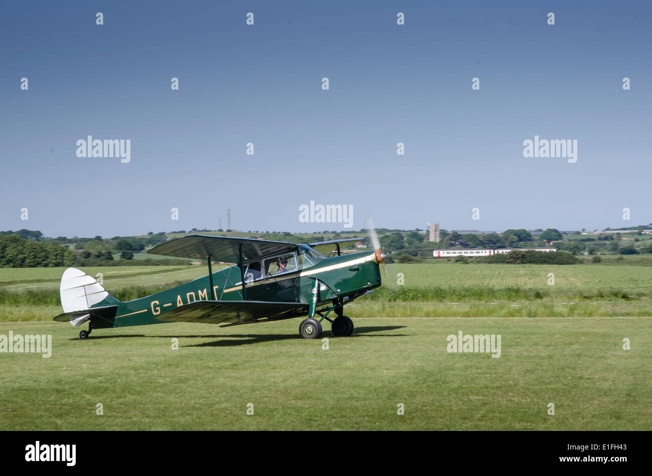De Havilland DH87B Hornet Moth biplane at Northrepps Airfield in Norfolk Stock Photo
