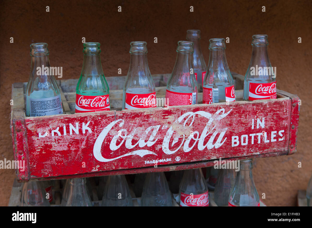 original wooden crates with empty coca cola bottles Stock Photo