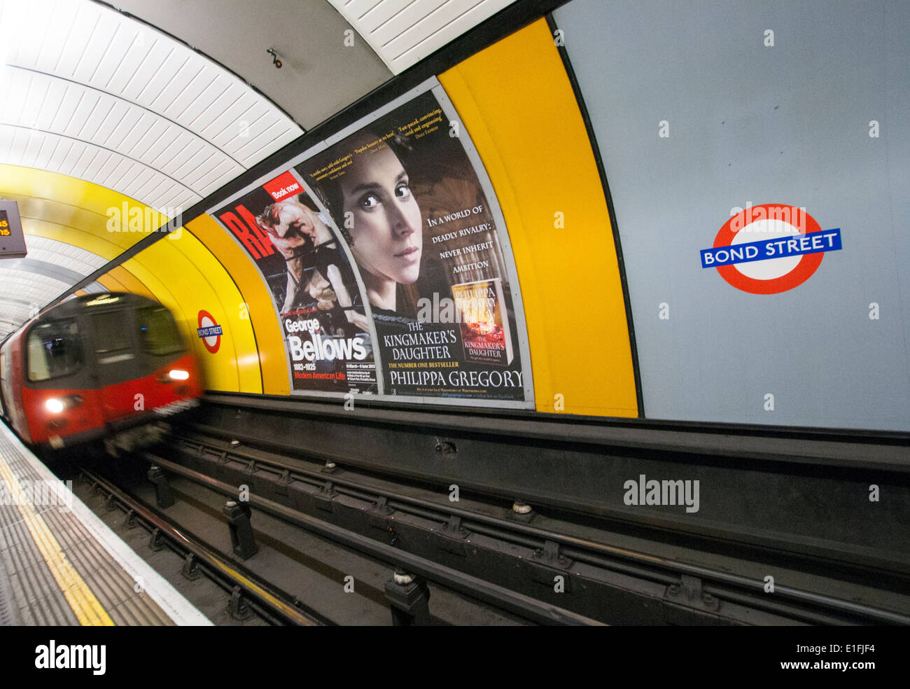 A train pulling out of Bond Street Station on the London Underground, England UK Stock Photo