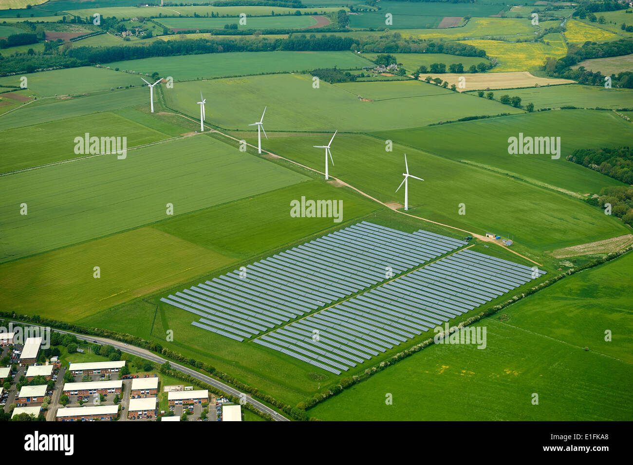 Solar farm adjacent to a wind farm, Oxfordshire, UK Stock Photo