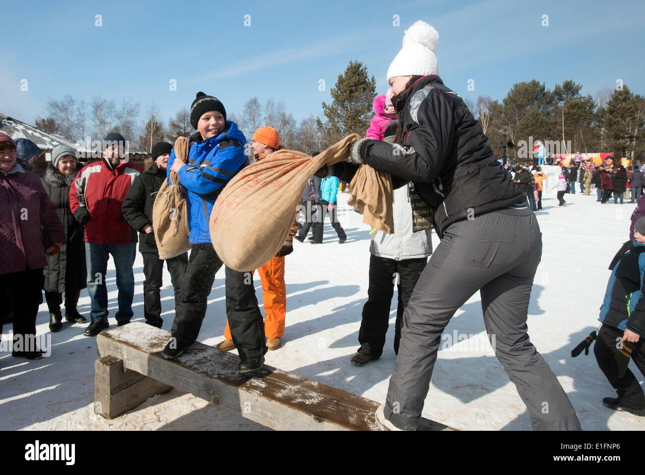Siberians celebrate the festival of Maslenitsa with outdoor games, Irkutsk, Siberia, Russia, Eurasia Stock Photo