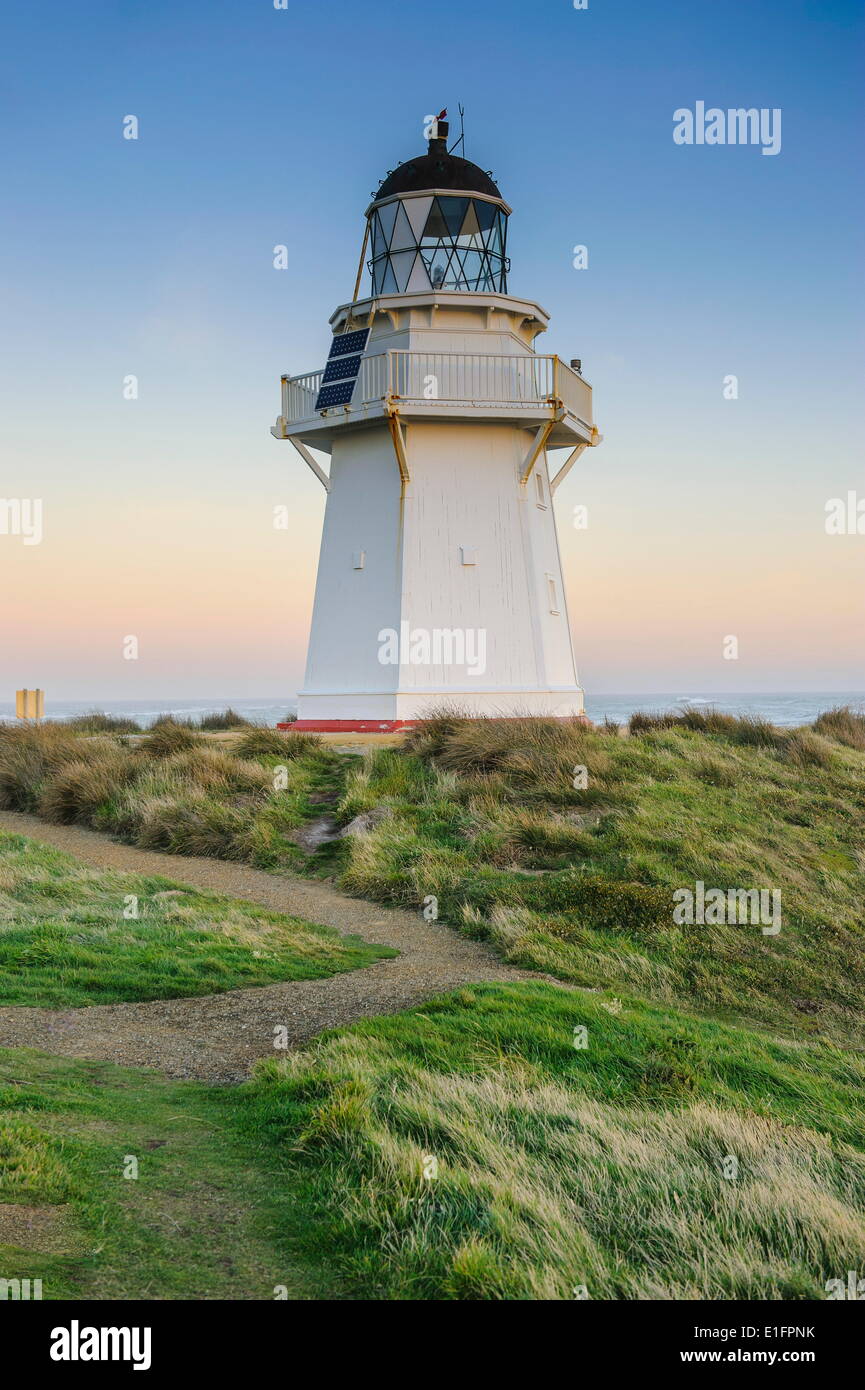 Waipapa Point Lighthouse at sunset, the Catlins, South Island, New Zealand, Pacific Stock Photo