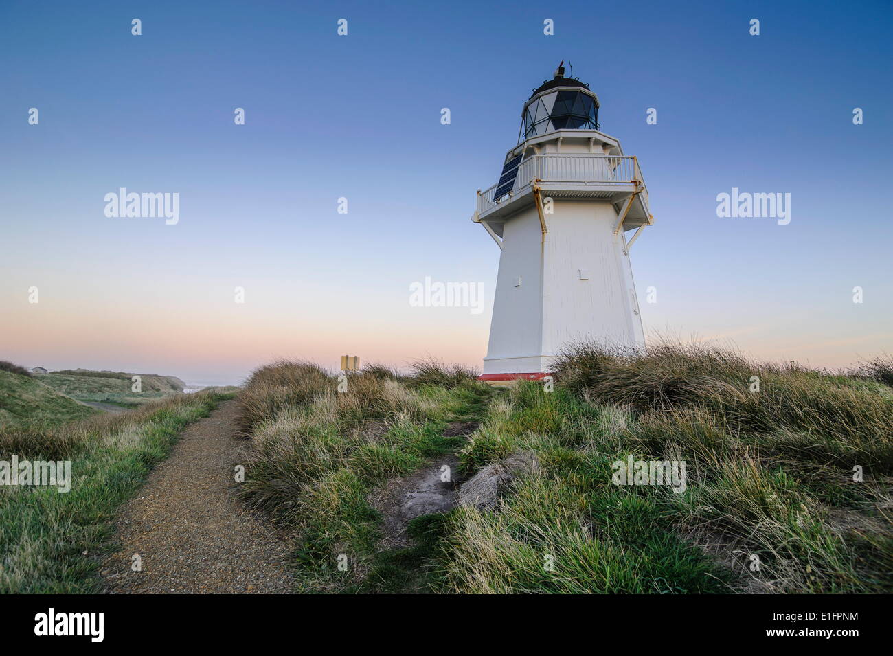 Waipapa Point Lighthouse at sunset, the Catlins, South Island, New Zealand Stock Photo