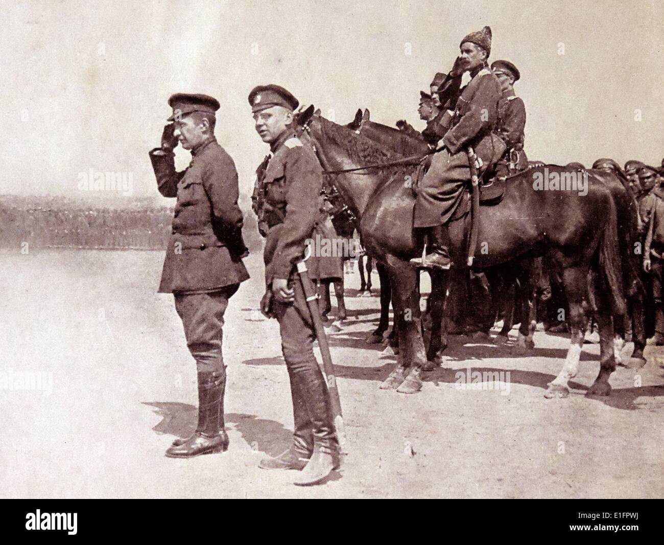 Photograph of Alexander Kerensky (1881 - 1970) the Russian Minister of War (and later Prime Minister of Russia) saluting troops during the Russian Revolution. Dated 1916 Stock Photo