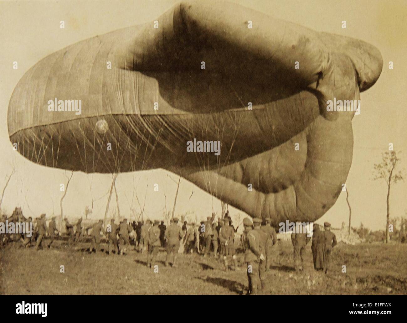 Photograph of an observation balloon being deflated. Gasfilled